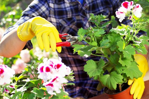 Gardeners preparing safely for outdoor maintenance work